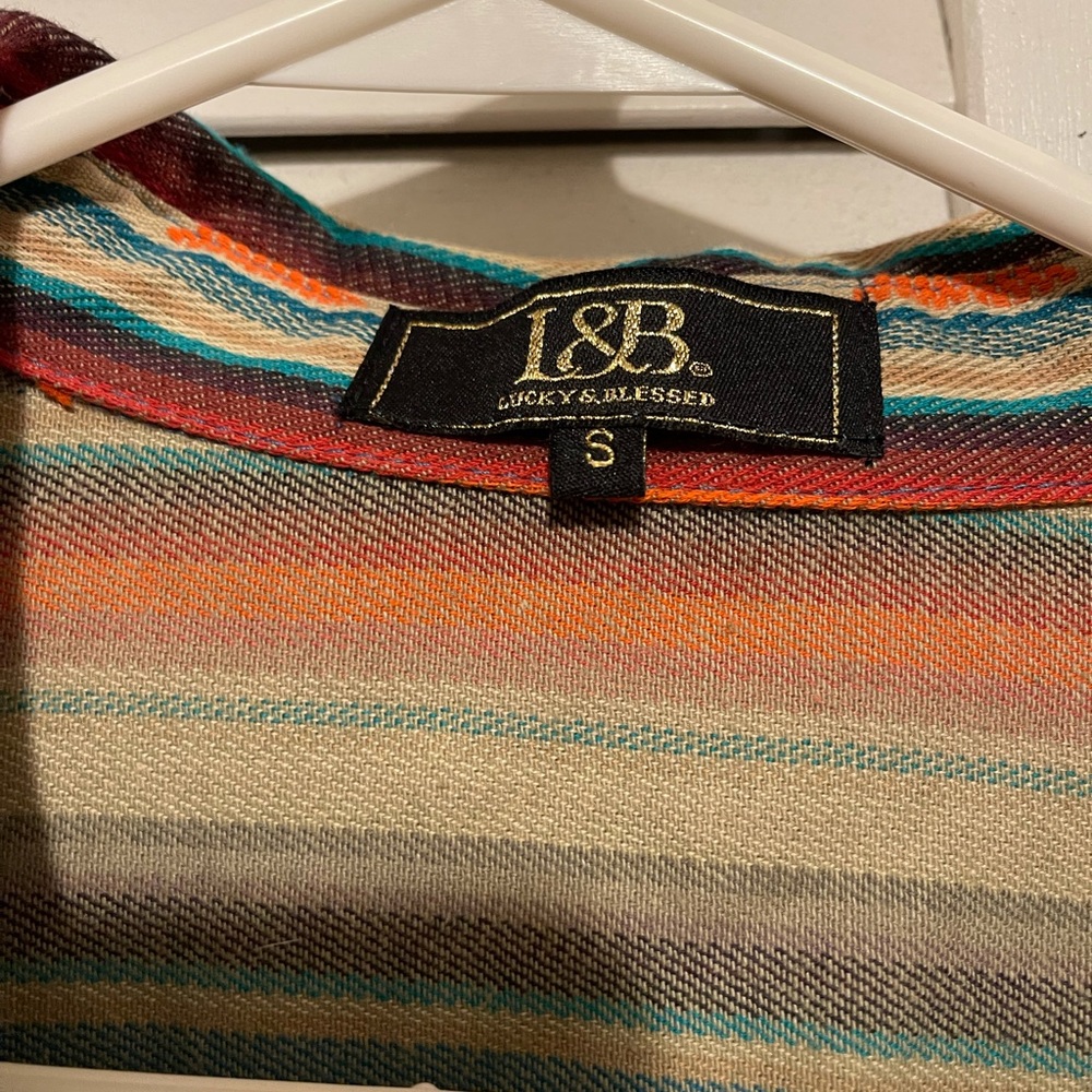 Cute top never worn.